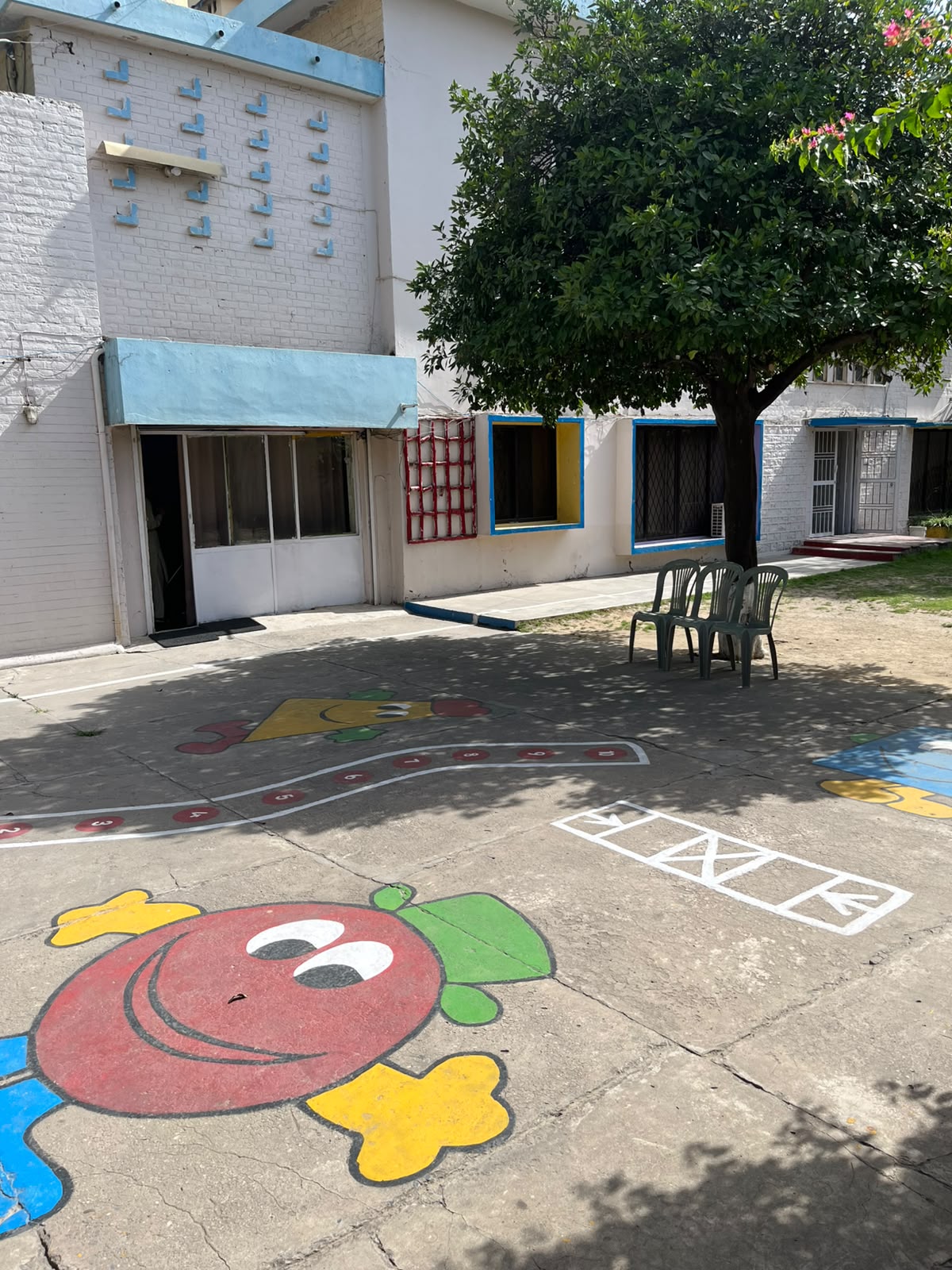 Painted courtyard outside the classroom block